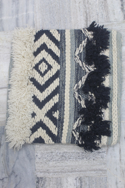 GEOMETRICAL DESIGN CUSHION COVER WITH EXTRA KNOTS AT EDGES